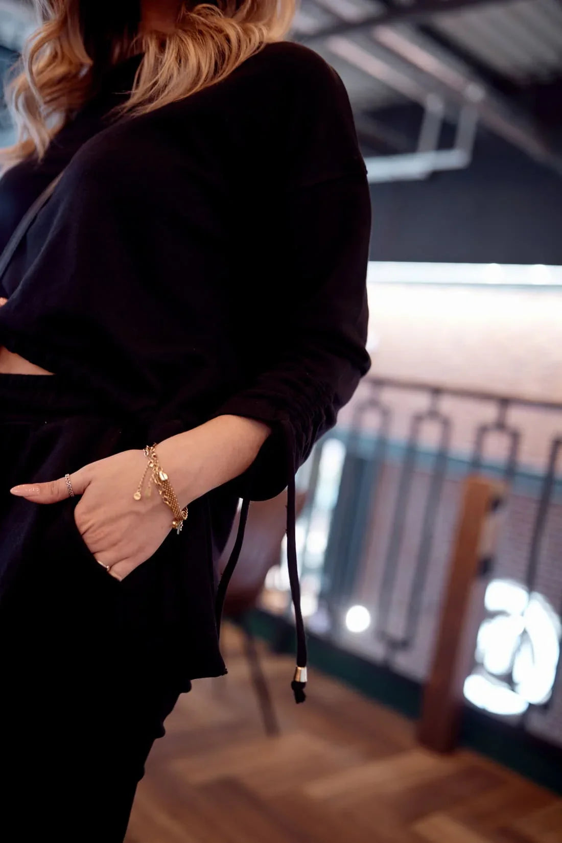 Smooth women's tracksuit with an asymmetric sweatshirt, black FI731 - Which Mark