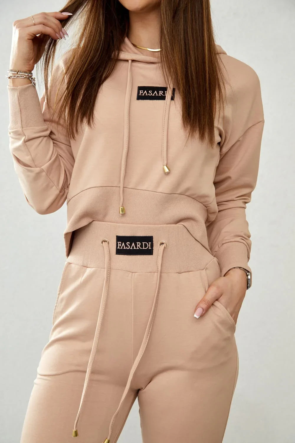 Women's tracksuit set with an asymmetric sweatshirt, beige FI718 - Which Mark